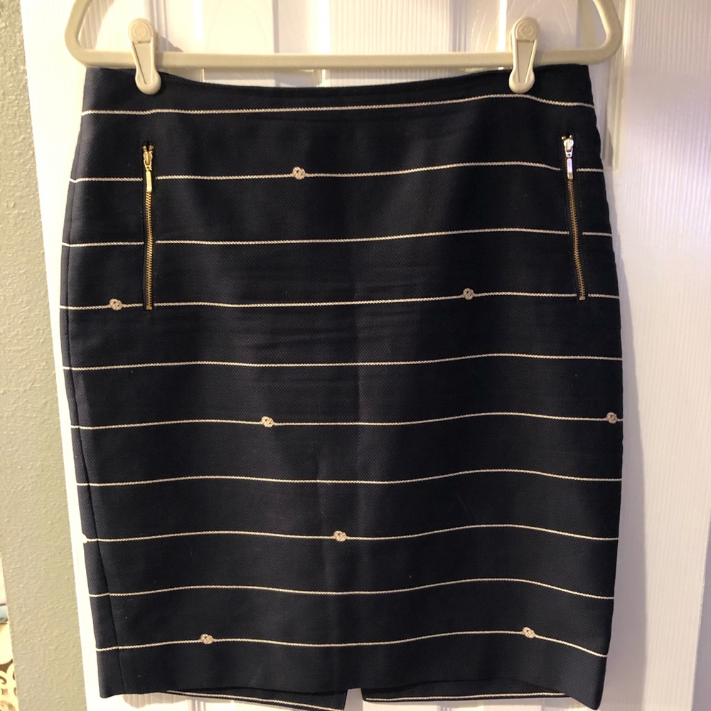 The limited navy skirt.